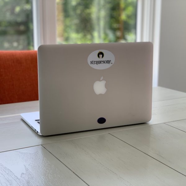 Mac book with Strawesome sticker